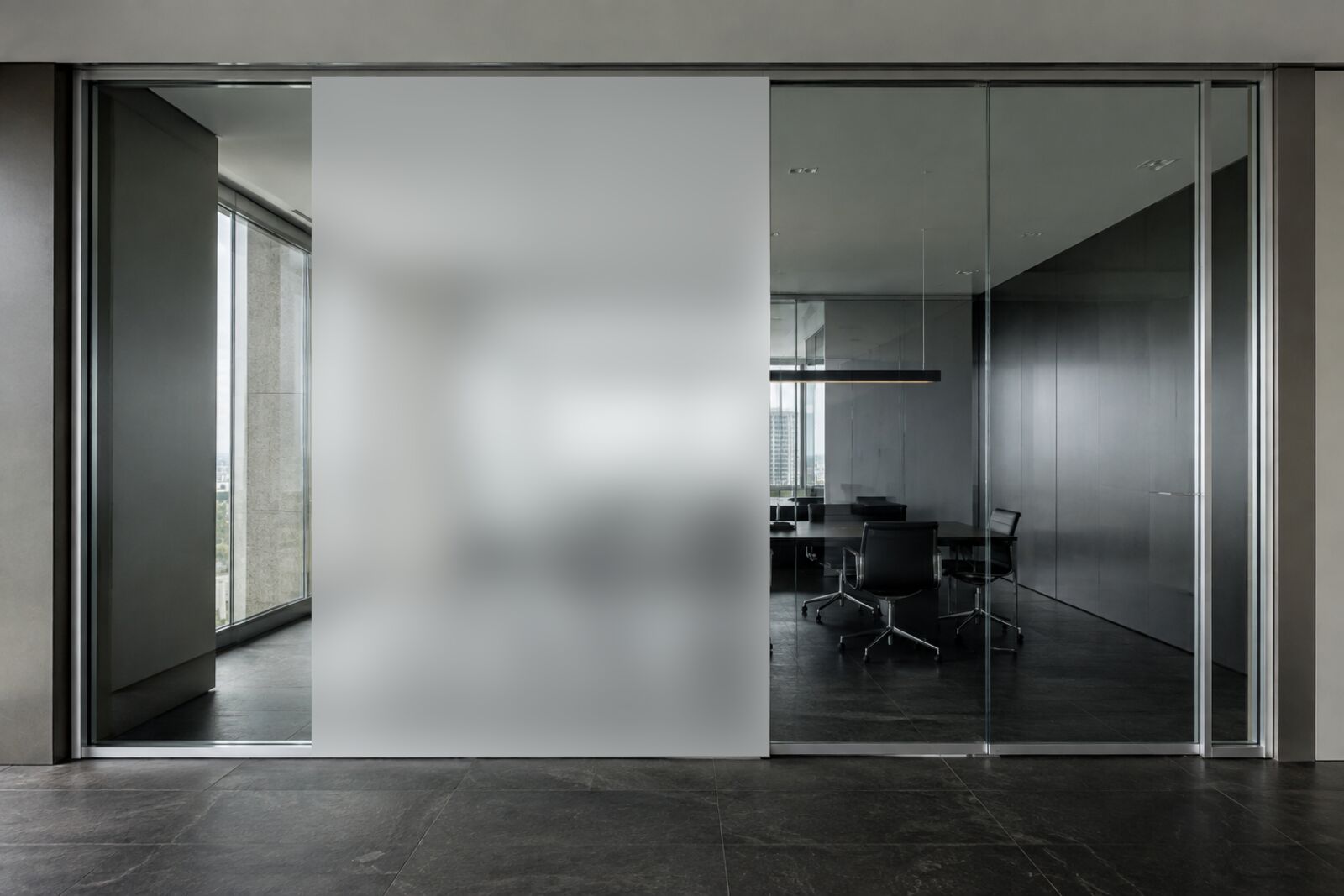 Meeting room glass partition, frosted to opaque